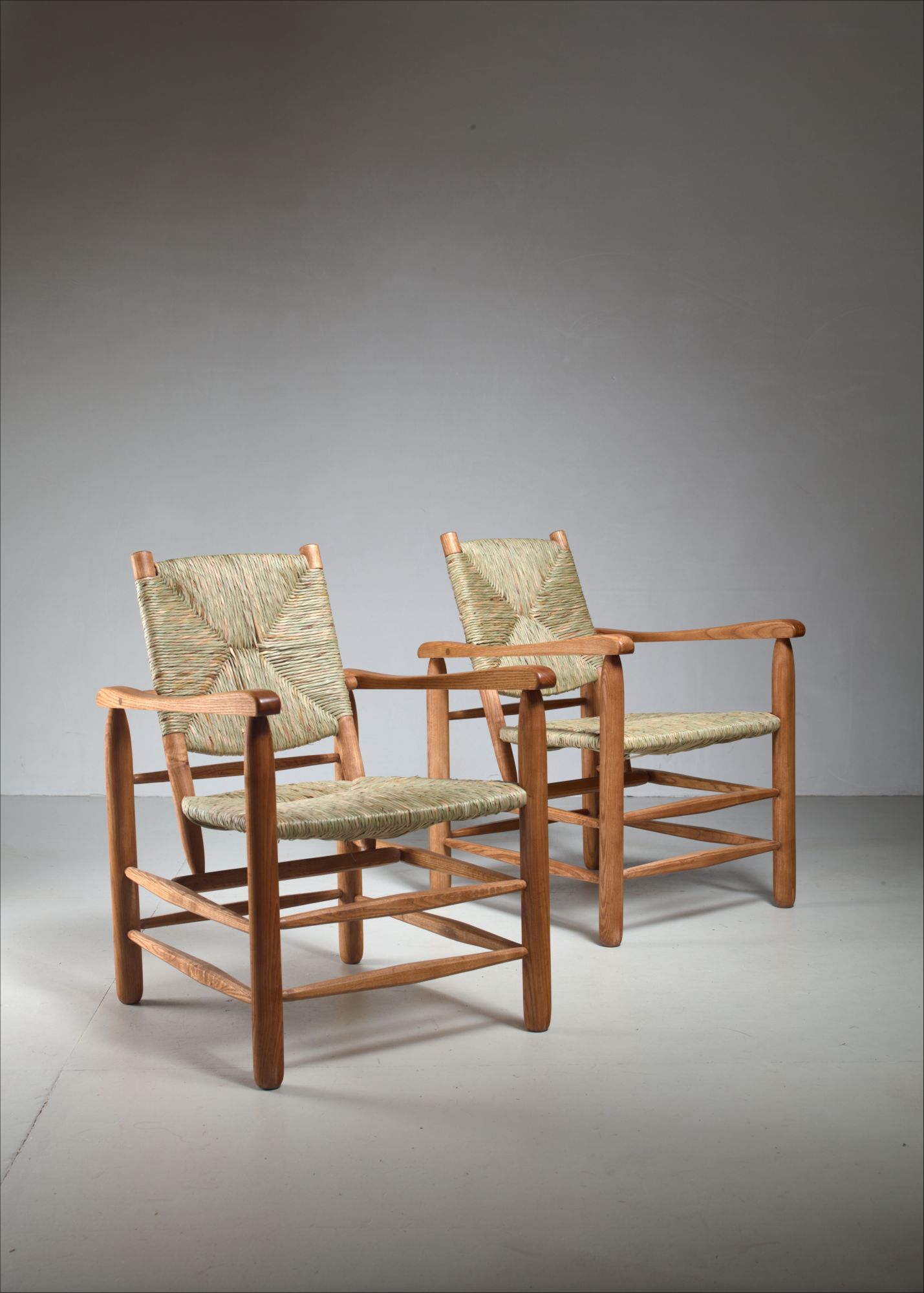 Pair Charlotte Perriand 'model no. 21' lounge chairs